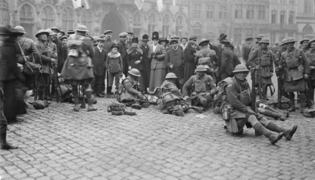 277_42nd Battalion resting in the Grand Place, Mons, on the morning of the 11th november, 1918 2